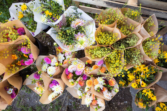 Assembly of commercial flower bouquets