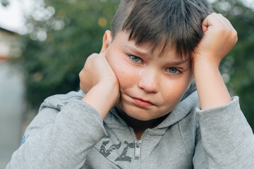 Crying disappointed sad teenage suffering from mental problems