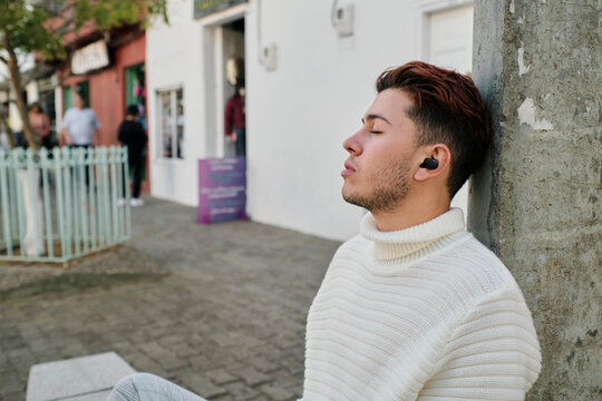 Relaxed man listening to music