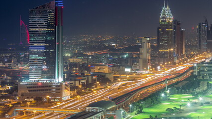 Fototapeta na wymiar Aerial view of Sheikh Zayed Road in Dubai Internet City area day to night timelapse