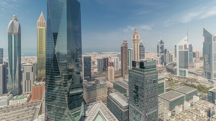 Panorama showing futuristic skyscrapers in financial district business center in Dubai on Sheikh Zayed road timelapse