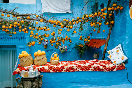 Orange Juice Stand in Blue Moroccan Street