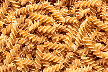 Macro blank photography of raw chickpea pasta, fusilli, macaroni, gluten free, spiral, raw,...