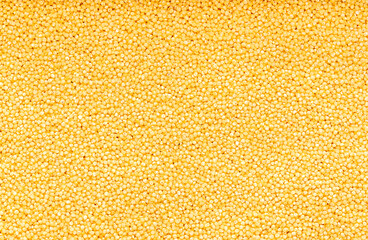 Macro blank photography of raw millet, cereal, grain, groat, health, vegetarian; natural, porridge