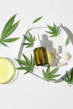 Hemp oil and Green leaves of medicinal cannabis