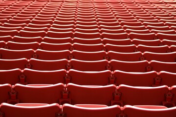 Rows of red stadium seats