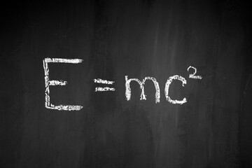 Theory of relativity. Albert Einstein. Physical formula. Black school board.E mc2