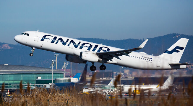 BARCELONA, SPAIN - FEBRUARY 2, 2020: View of OH-LZN Airbus A321 of Finnair Airlines flies up from Barcelona Airport (BCN)