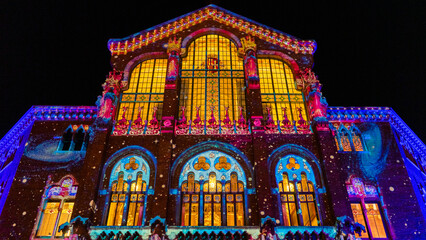 mosaic of lights on the facade of this building, lights of sant Pau in Barcelona, modern art concept