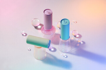 Group of pastel color aluminium cans on crystal blocks over color