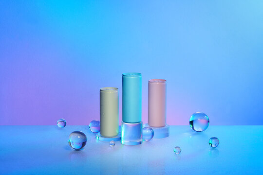 Three cans of pastel color aluminum can with a refreshing drink