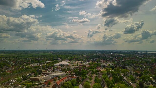 Stunning Aerial Drone Timelapse of a Vibrant Cityscape, Hyperlapse from above, Viewof the Traffic, Moving Clouds, and the Beauty of Spring, Zeitraffer 