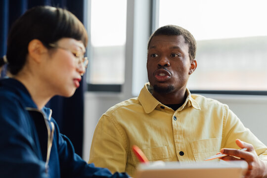 Man and Woman Working in Office