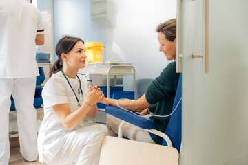 Female patient listening to doctor