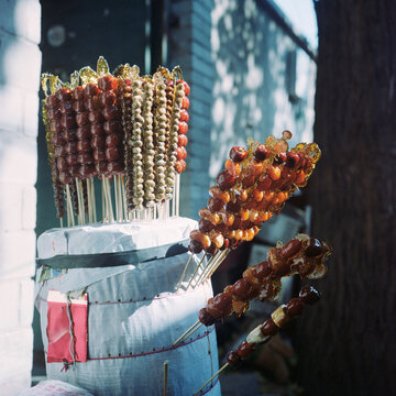 Tomatoes on sticks sold in Hutong