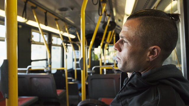 Man Riding Public Transportation