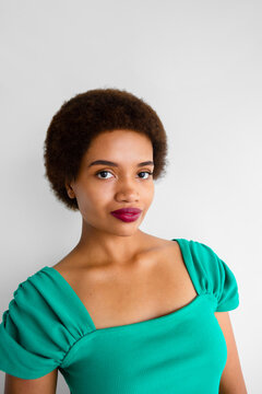 Portrait of beautiful young woman isolated with afro