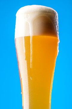 Spilled Beer on a Blue Background