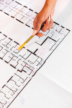 Crop architect woman working on project
