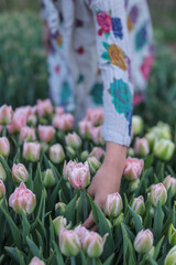 Child with tulips