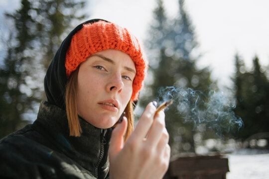 A young woman smoking