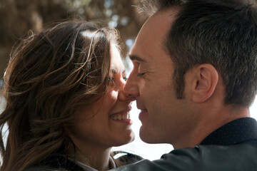 young couple together in a park