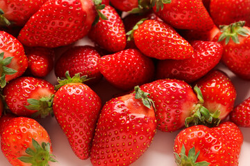 Texture of fresh strawberries as background