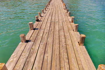 Fototapeta premium panoramic seascape view with deserted rustic wooden pier