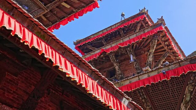 Slow motion of beautiful Multi-Tier Temple's rooftop and blue sky at Durbar Square, Kathmandu, Nepal