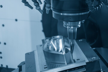 The CNC milling machine cutting injection mold part by solid barrel  tool.