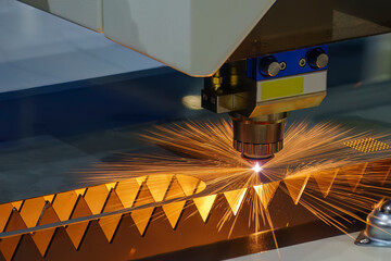 Close-up scene the fiber laser cutting machine cutting  machine cut the metal plate.