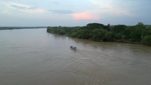 Tracking shot of a boat on the river Rio Cauca in Colombia