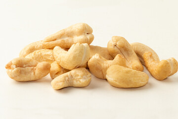 Cashew nuts  pile isolated on white background.