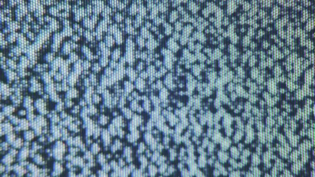 noise pattern close up of a crt tv screen. Glitches and interference lines, pixelated snow texture.