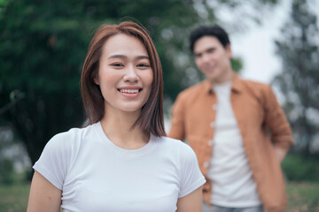 Obraz premium Photo of young Asian couple outside