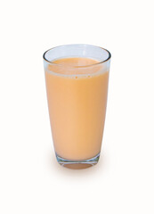 Lactic fermenting beverage color light orange sour taste in glass tall isolated on white background. Lactobacillus acidophilus improves condition of stomach. Fermented milk vitamin B2 low cholesterol.