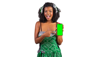 portrait, Black Brazilian woman in festa junina clothes. Saint John's festival. holding Smartphone, green screen.