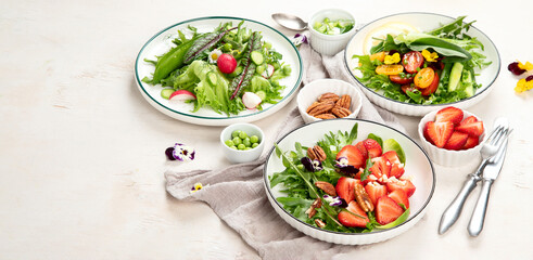 Various of spring vegetable salads. Tasty healthy food.