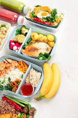 Restaurant healthy food delivery in take away boxes for daily nutrition on white background.