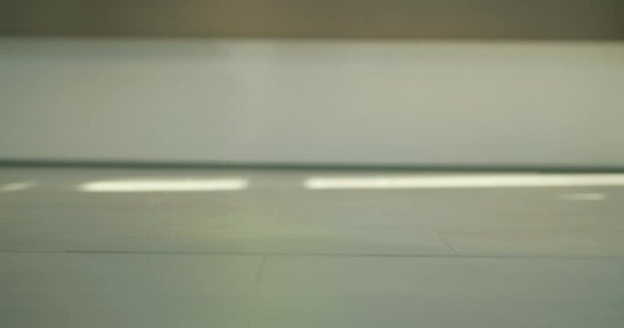 steps in the lobby, moving, walking, people's feet