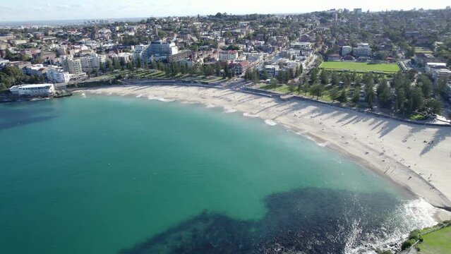 Coogee Beach And Blue Sea In Summer From Goldstein Reserve Park In Sydney, NSW, Australia. - aerial wide