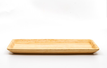 Small serving wooden tray with empty space for bakery or other snacks, side view, image on white background, the clipping path around the wooden tray in the file.