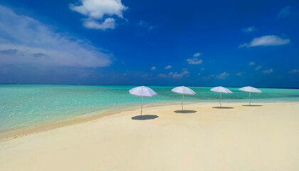 Summer tropical with white umbrella on the beach with  blue sky background