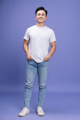 Obraz premium Photo of young Asian man on background