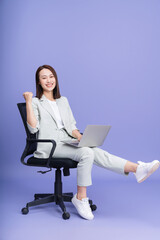 Photo of young Asian businesswoman on background