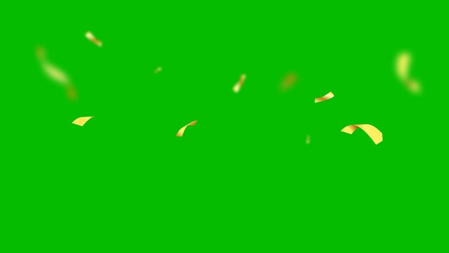Golden blur glitter falling paper tape confetti tinsel on green background. Video 4K animation