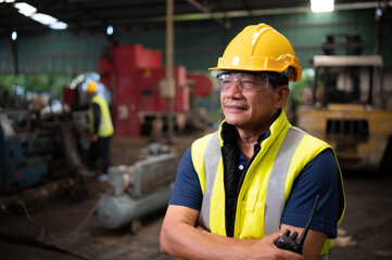 Portrait of technician team leader and team that is ready for repairing old machinery to return to...