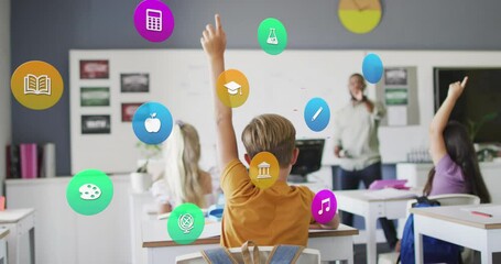 Animation of school icons over african american male teacher and children raising hands in class