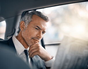 Man, reading newspaper and car for business travel, journey or drive while thinking of news. Professional male person with media paper in passenger seat for work with luxury transportation or a taxi