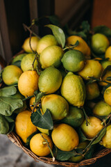 heap of lemons on a market